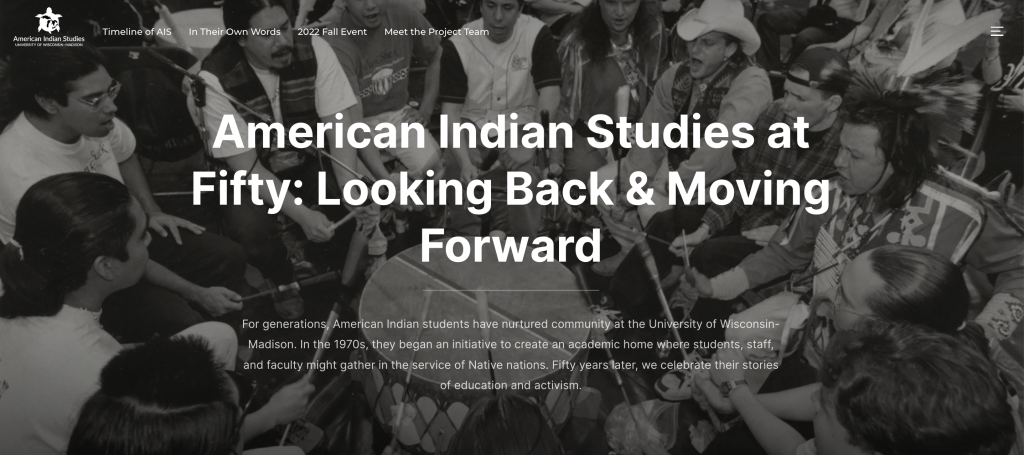 Image black and white of drum circle with white text overlay